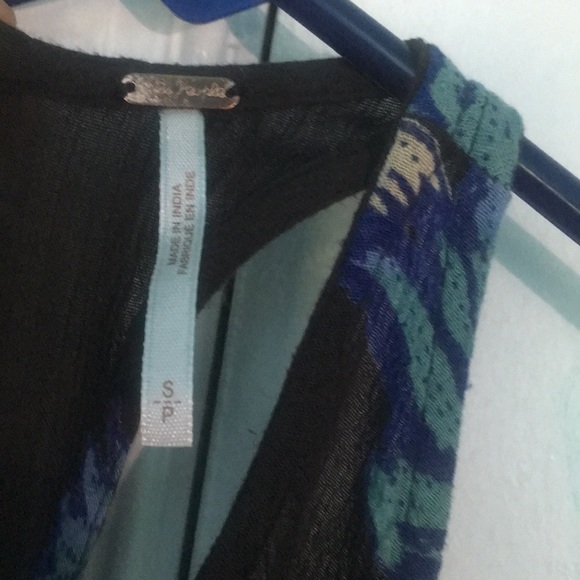 Free people dress with the ties in the back. - Picture 2 of 3